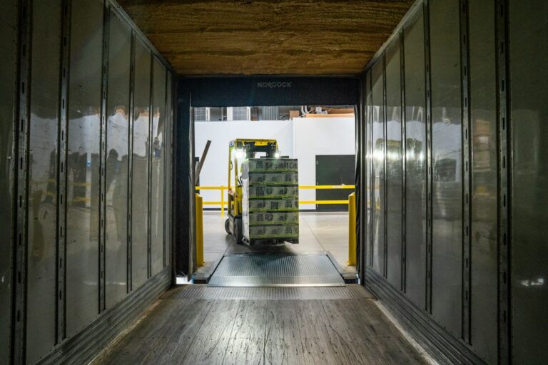 Forklift operating in a freight warehouse