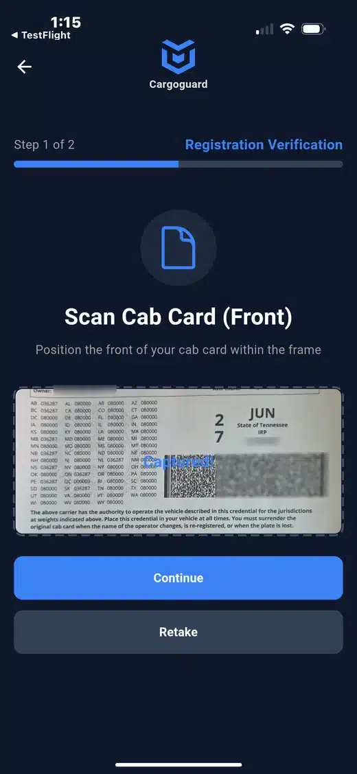 CargoGuard driver app capturing the front of a truck cab card for registration verification.
