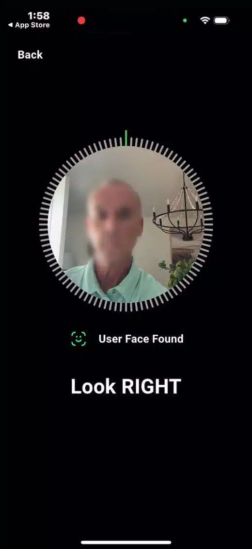 CargoGuard driver app guiding a selfie verification check.