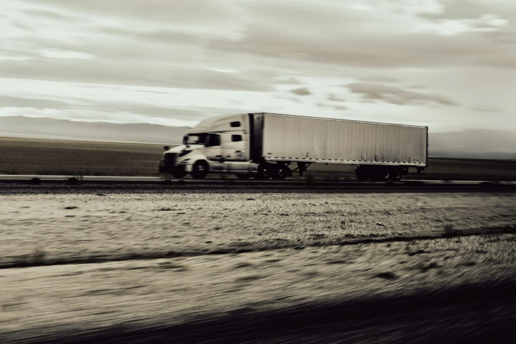 Semi truck traveling on a highway toward Los Angeles