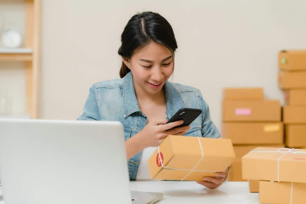 Business professional using a computer for logistics registration and records