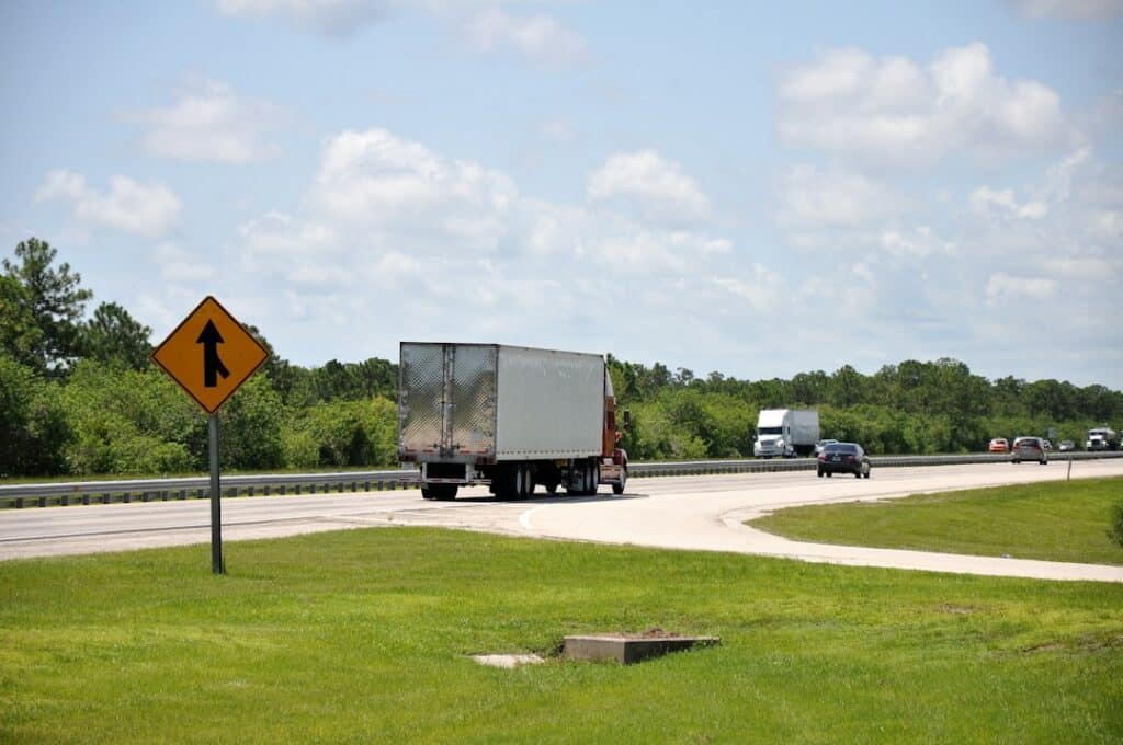 Commercial truck traveling on a divided highway